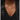 Necklace with diamond pendants on a person wearing a black top, showing diamond size measurements.